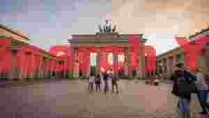 iconic brandenburg gate at sunset