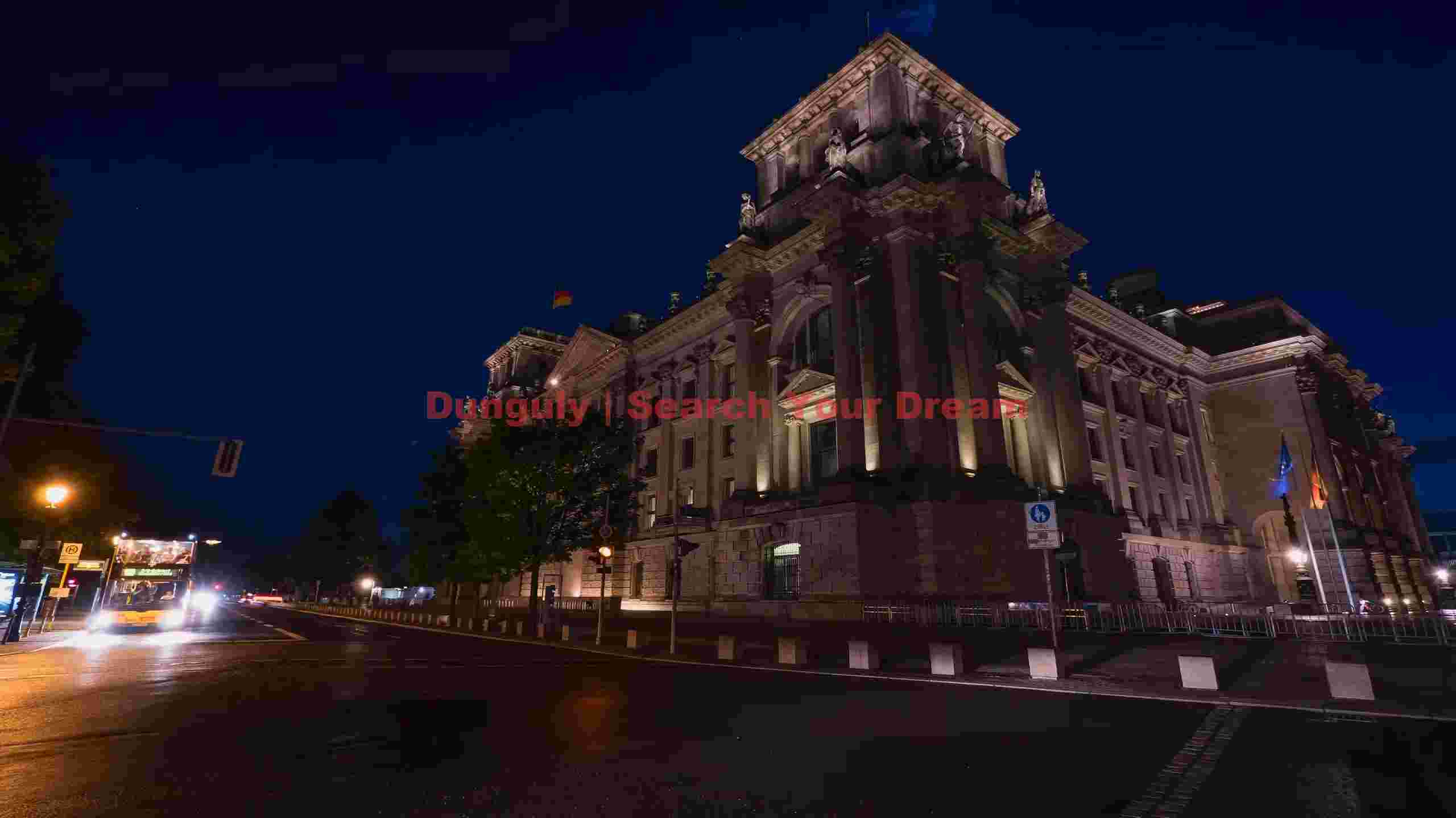 illuminated german parliament at dusk illuminated german parliament at dusk