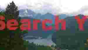 majestic alpine lake with mountain peaks