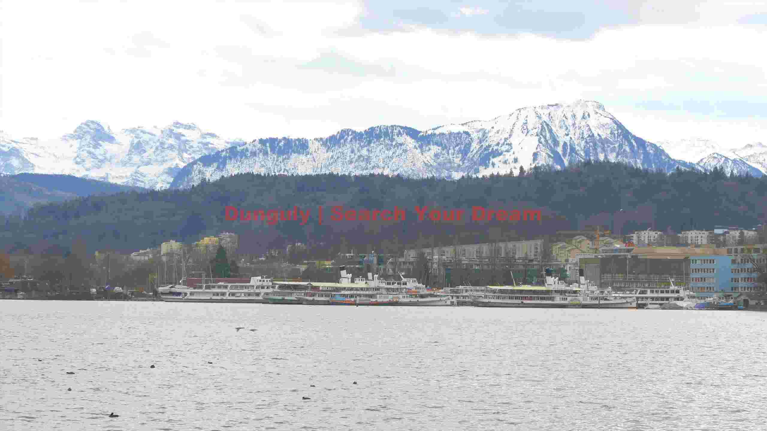 majestic alpine lake with snow capped peaks majestic alpine lake with snow capped peaks