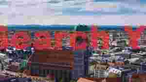 munich cityscape with frauenkirche and alps
