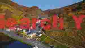 At Home scenic autumn village and vineyards by the river