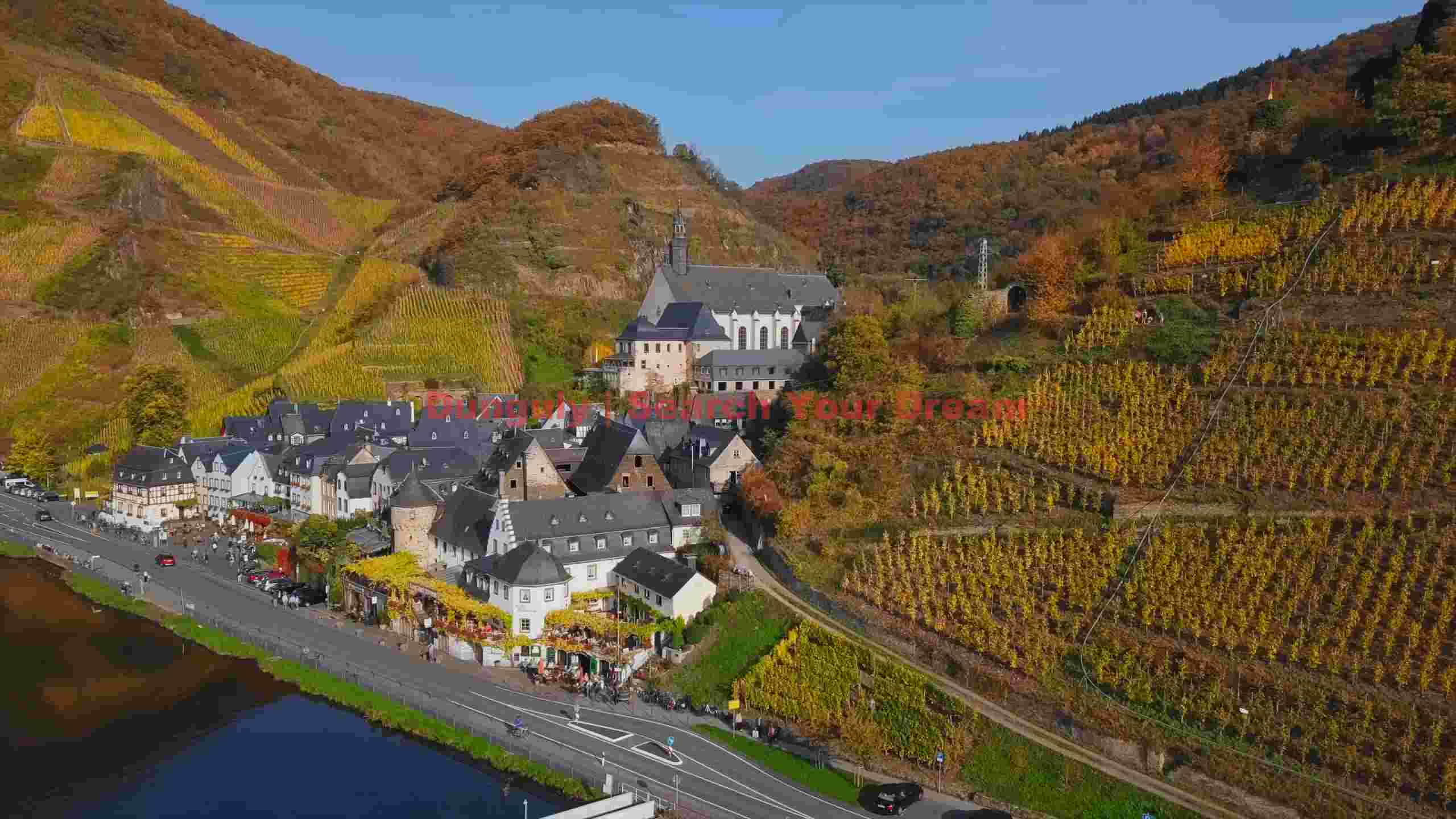 scenic autumn village and vineyards by the river scenic autumn village and vineyards by the river