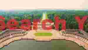 At Home serene palace and reflecting pond aerial view